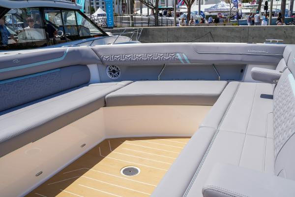 Slide: The Image of Luxurious seating area on the 2025 Regal 50 SAV yacht. - 23
