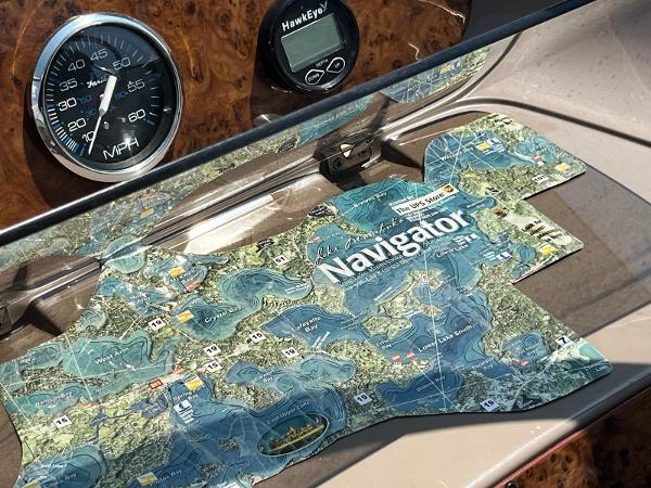 Slide: The Image of Boat dashboard with map and speedometer, Regal 2760, 1998 model. - 14