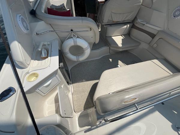 Slide: The Image of Interior of 1998 Regal 2760 boat with seating and life preserver. - 4