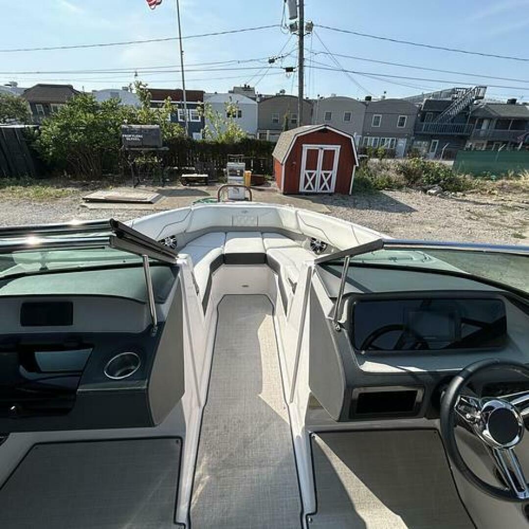 Slide: The Image of Walkthrough Windshield  Windshield walkthrough on this 2021 Regal LS4 for sale by Lucas Sochacki at Parma Marine (440) 915-8995 - 5184953