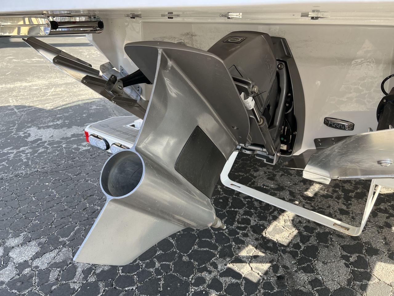 Slide: The Image of Close-up of the 2023 Regal LS6 Surf boat's propulsion system and propeller. - 28