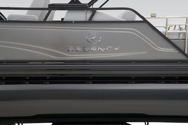 Slide: The Image of 2024 Regency 230 LE3 Sport pontoon boat side view. - 11