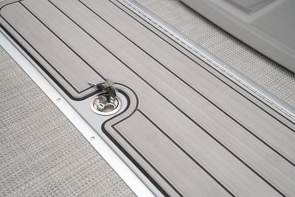 Slide: The Image of 2024 Regency 230 LE3 Sport boat deck with sleek, modern design and durable materials. - 25