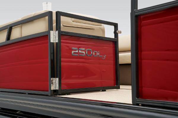 Slide: The Image of 2024 Regency 250 DL3 pontoon boat with red side paneling. - 23