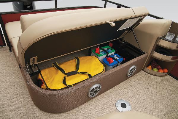 Slide: The Image of 2024 Regency 250 DL3 boat storage compartment with life jackets and supplies. - 39