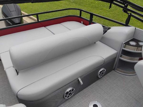 Slide: The Image of 2024 Regency 250 DL3 boat interior with gray seating and cup holders. - 6