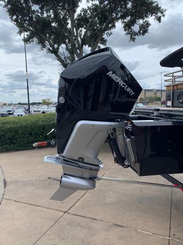 Slide: The Image of 2024 Regency 250 LE3 Sport boat with Mercury outboard motor. - 5