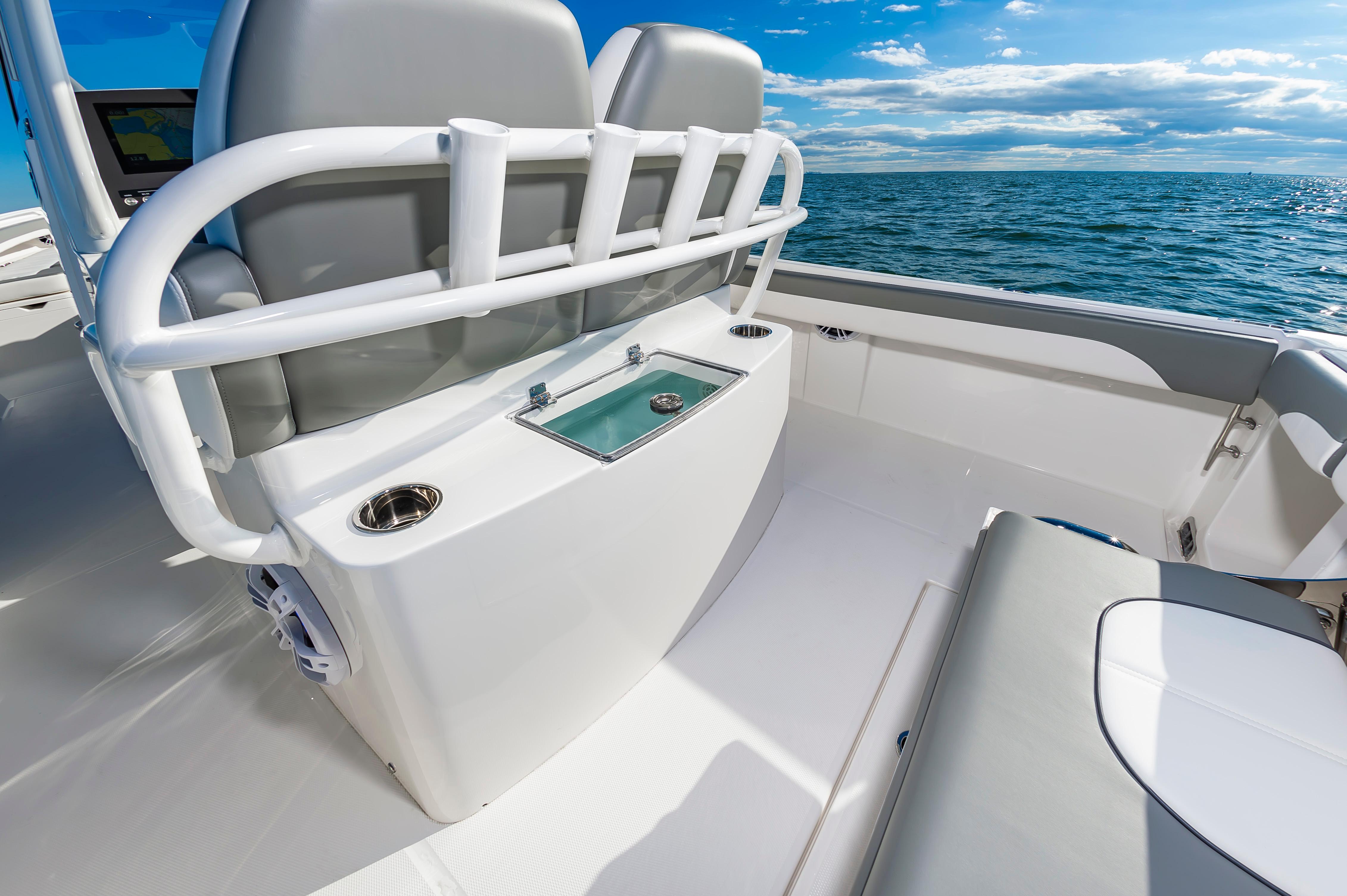 Slide: The Image of 2024 Regulator 28 boat interior with seating and ocean view. - 15