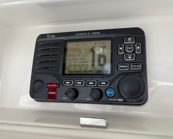 Slide: The Image of ICOM VHF Marine IC-M506G radio on 2016 Regulator 34SS boat dashboard. - 27