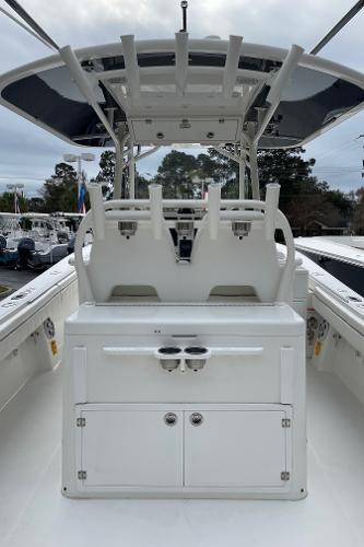 Slide: The Image of 2016 Regulator 34SS boat interior with seating and storage, featuring a sleek design. - 30