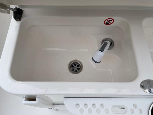 Slide: The Image of 2016 Regulator 34SS boat sink with faucet and drain. - 32