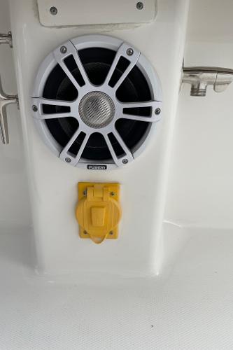 Slide: The Image of 2016 Regulator 34SS boat speaker and yellow outlet on white panel. - 40