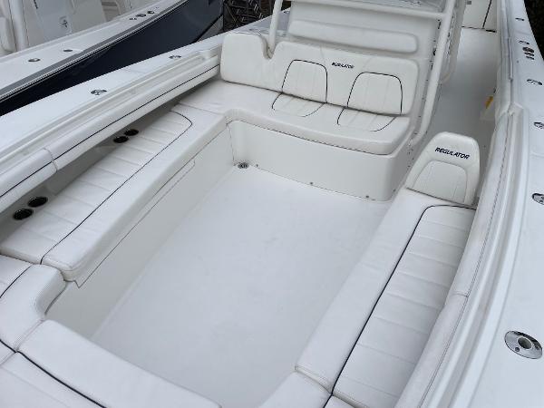 Slide: The Image of 2016 Regulator 34SS boat interior with white seating and spacious layout. - 42