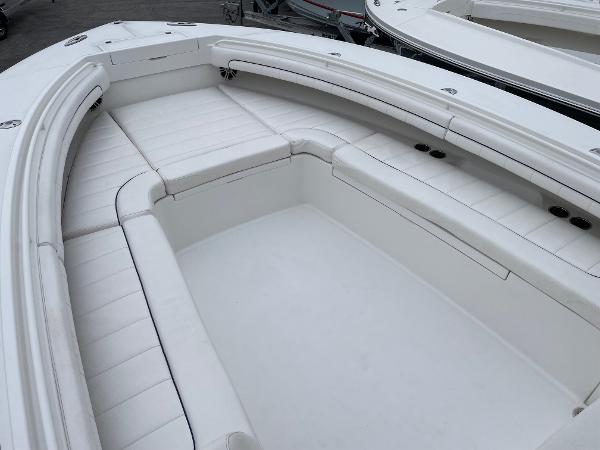Slide: The Image of 2016 Regulator 34SS boat interior with white cushioned seating. - 45