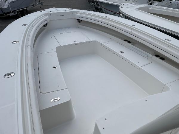 Slide: The Image of 2016 Regulator 34SS boat interior with spacious seating and storage compartments. - 46