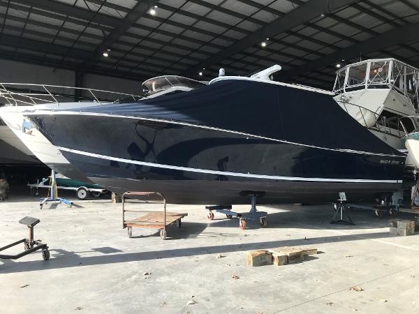 Slide: The Image of 2019 Regulator 34 SS boat in a storage facility. - 1