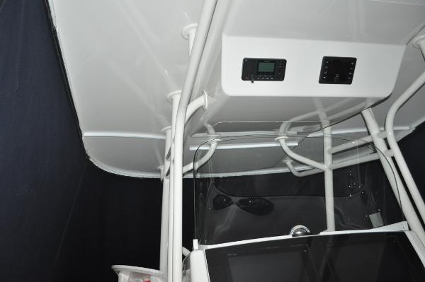 Slide: The Image of 2019 Regulator 34 SS boat console and T-top structure. - 11
