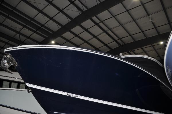Slide: The Image of 2019 Regulator 34 SS boat in indoor storage facility. - 2