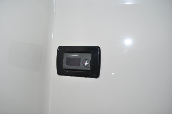 Slide: The Image of Dometic control panel on 2019 Regulator 34 SS boat. - 25
