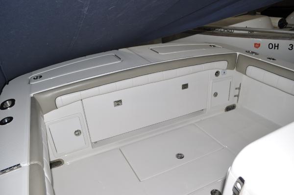 Slide: The Image of 2019 Regulator 34 SS boat interior with storage compartments. - 32