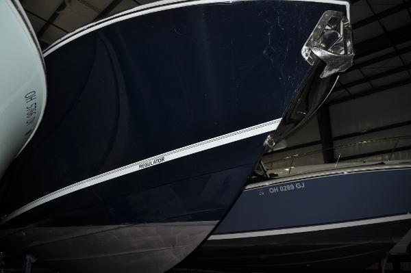 Slide: The Image of 2019 Regulator 34 SS boat in a storage facility. - 36