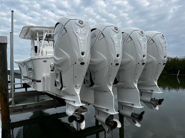 Slide: The Image of 2024 Regulator 41 boat with quad 450 V8 engines docked. - 15