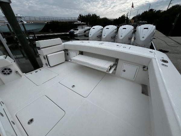 Slide: The Image of 2024 Regulator 41 boat deck with quad engines at dock. - 18