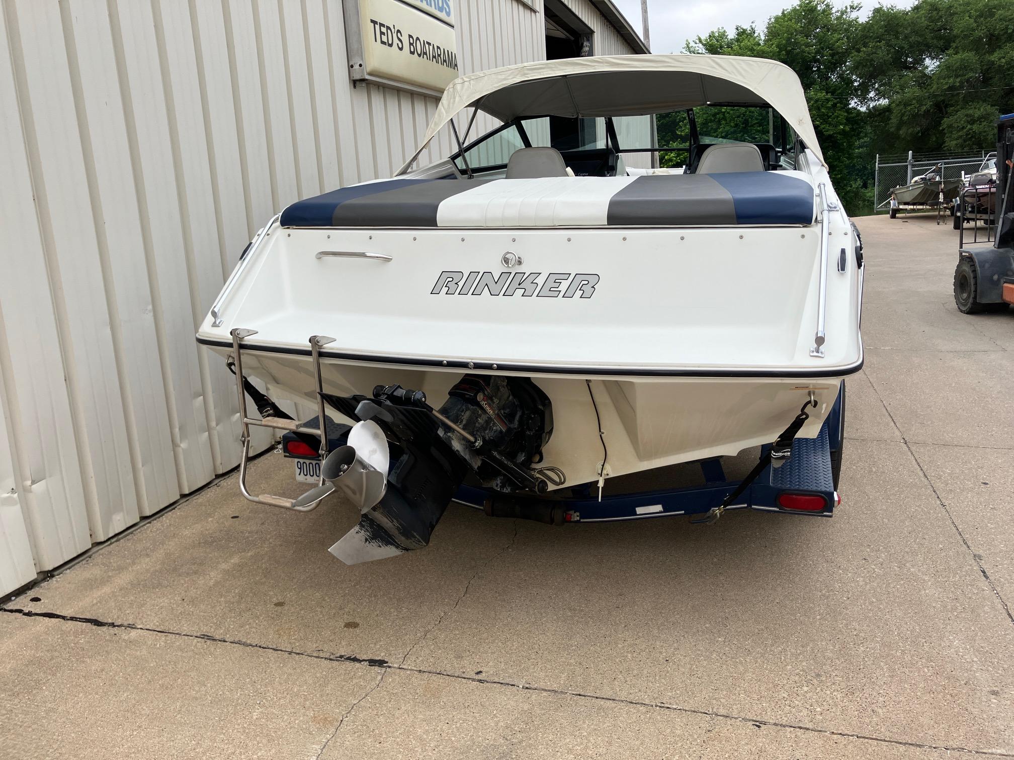 Slide: The Image of 1989 Rinker 206 Open Bow boat, rear view, parked at Ted's Boatarama. - 3