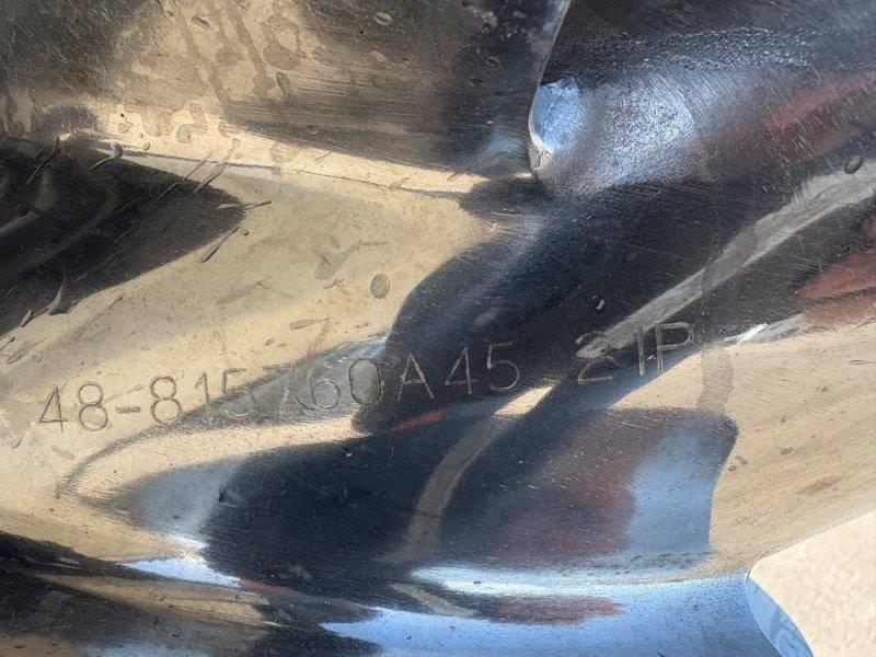 Slide: The Image of Close-up of a metal surface with engraved numbers, related to a 1994 Rinker 209 Captiva. - 31