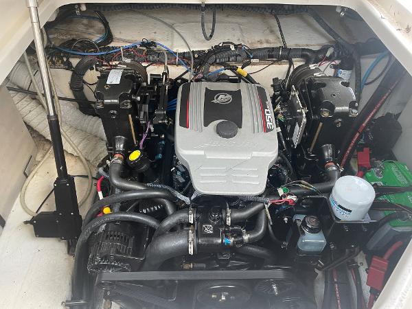 Slide: The Image of Engine compartment of a 2008 Rinker 260 Express Cruiser, showcasing detailed mechanical components. - 15