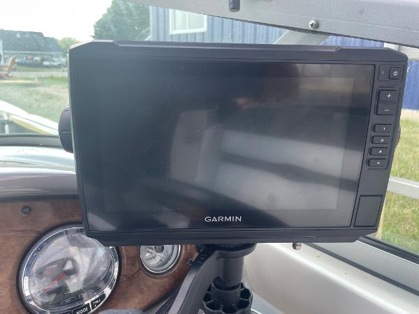 Slide: The Image of Garmin navigation system on 2008 Rinker 260 Express Cruiser dashboard. - 19