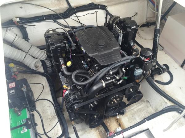 Slide: The Image of 2007 Rinker 270 Express Cruiser engine compartment with visible components. - 20