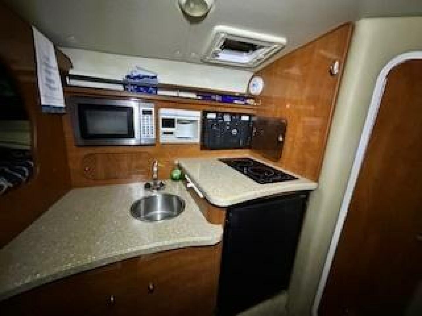 Slide: The Image of Rinker 320 Express 2005 - 5088483