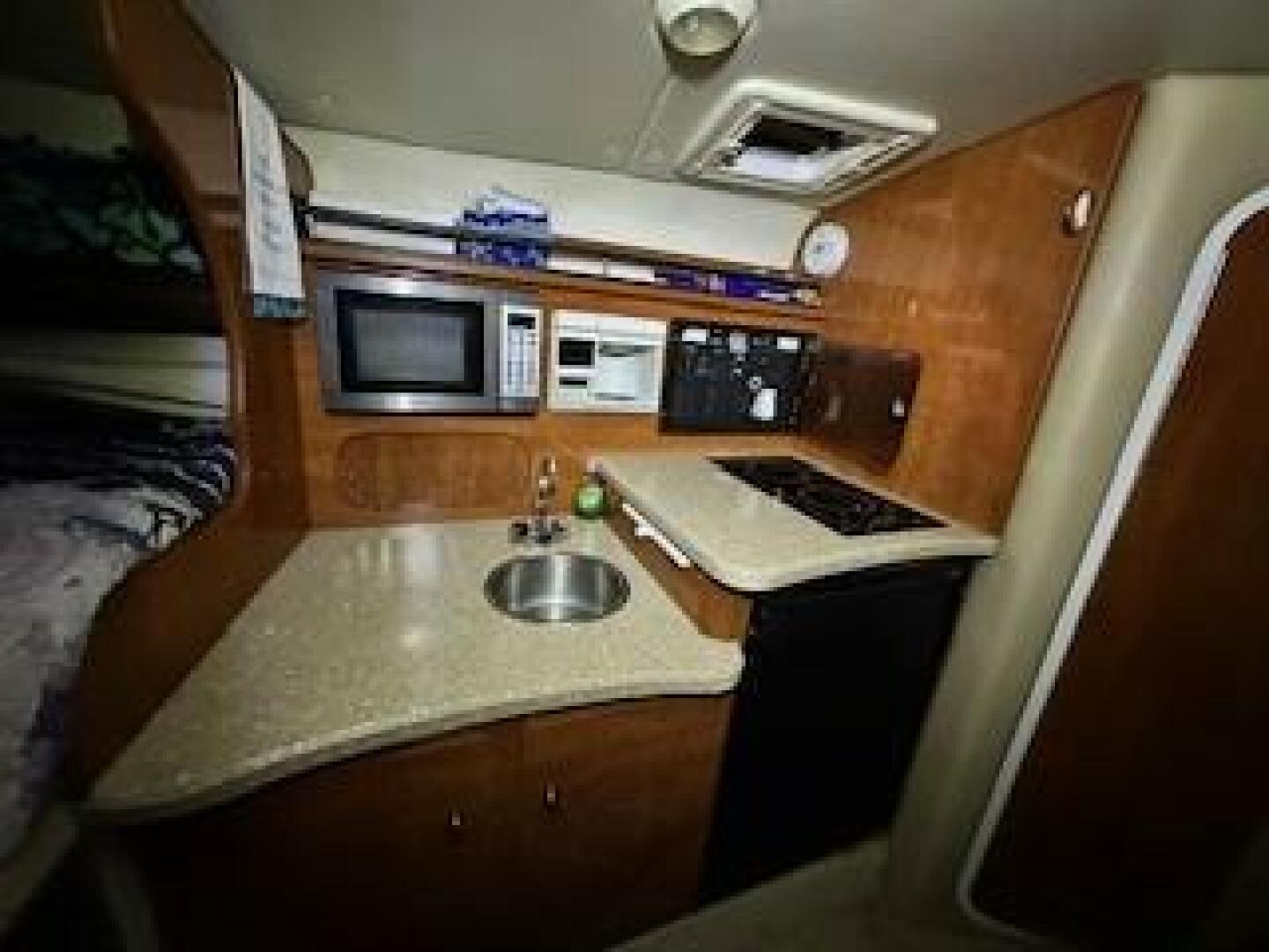 Slide: The Image of Rinker 320 Express 2005 - 5088459