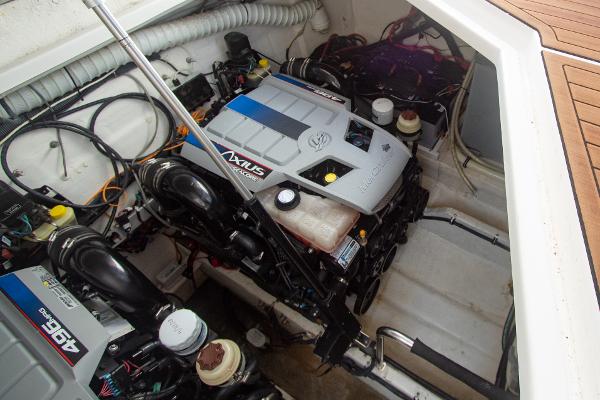 Slide: The Image of Engine compartment of a 2008 Rinker 400 Express Cruiser with twin MerCruiser engines. - 19