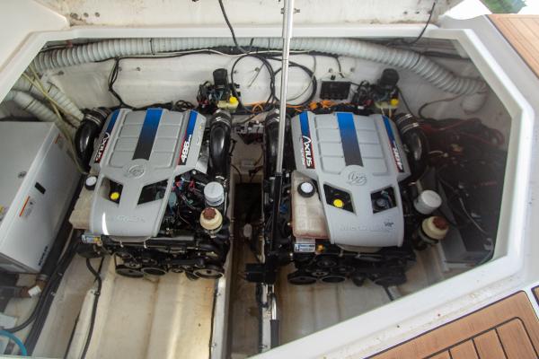 Slide: The Image of 2008 Rinker 400 Express Cruiser engine compartment with twin MerCruiser engines. - 20