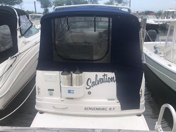 Slide: The Image of 2003 Rinker Fiesta Vee 270 boat docked, named Salvation, in Remsenburg, N.Y. - 2
