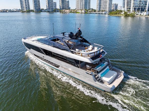 Slide: The Image of Luxurious 2024 Riva 102 Corsaro Super yacht cruising in a scenic waterfront setting. - 17