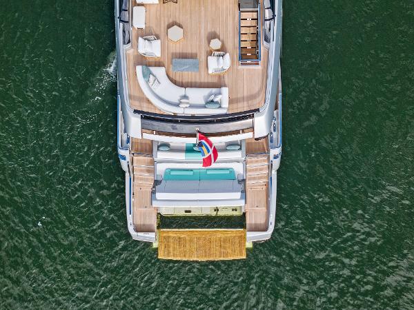 Slide: The Image of Aerial view of 2024 Riva 102 Corsaro Super yacht on water. - 22