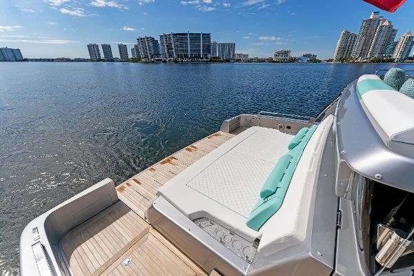 Slide: The Image of Luxury 2024 Riva 102 Corsaro Super yacht with scenic waterfront city view. - 30