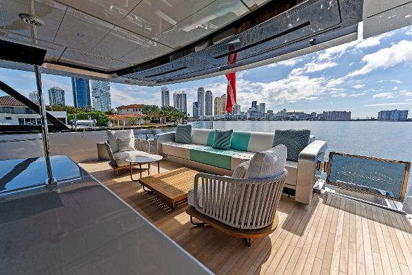 Slide: The Image of Luxurious deck of 2024 Riva 102 Corsaro Super yacht with city skyline view. - 32