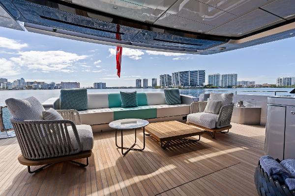 Slide: The Image of Luxurious deck of 2024 Riva 102 Corsaro Super yacht with modern seating and scenic view. - 35