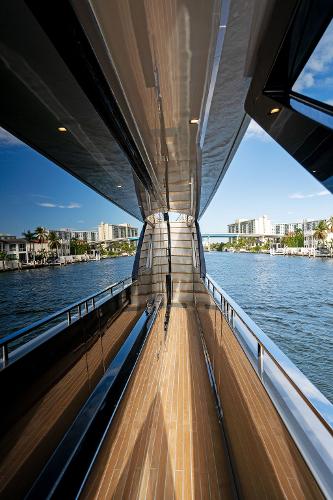 Slide: The Image of 2024 Riva 102 Corsaro Super yacht deck with waterfront view. - 37
