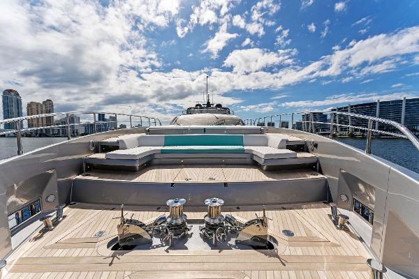 Slide: The Image of Luxurious 2024 Riva 102 Corsaro Super yacht deck with city skyline view. - 40