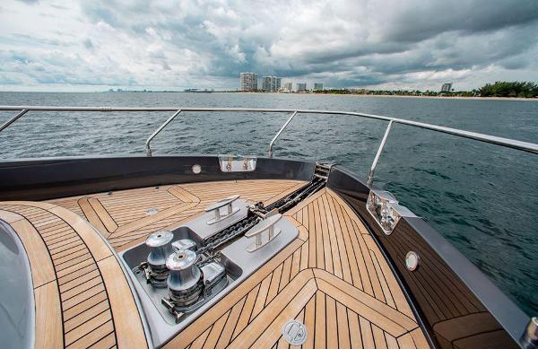 Slide: The Image of 2017 Riva 88 Domino Super yacht deck with ocean and city skyline. - 15