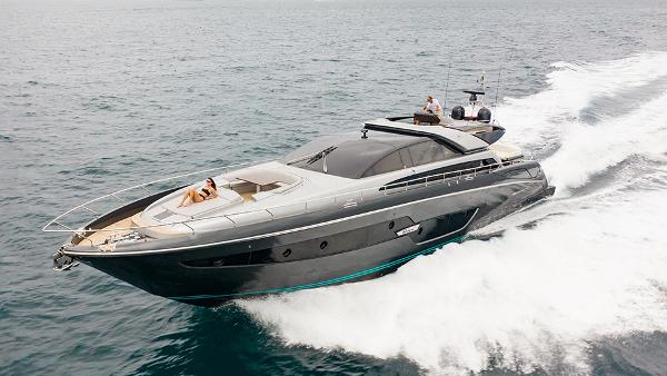 Slide: The Image of 2017 Riva 88 Domino Super yacht cruising on the ocean. - 2