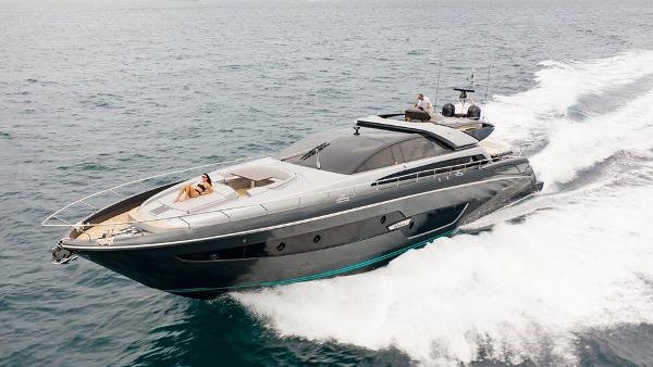 Slide: The Image of 2017 Riva 88 Domino Super yacht cruising on the ocean. - 9