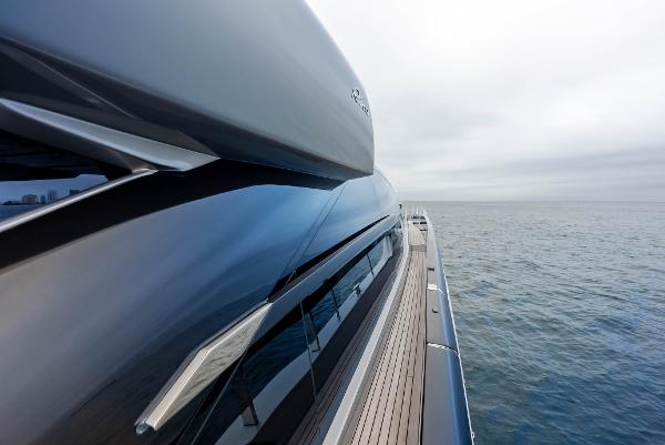 Slide: The Image of Side view of 2021 Riva 88' FOLGORE yacht on the ocean. - 13