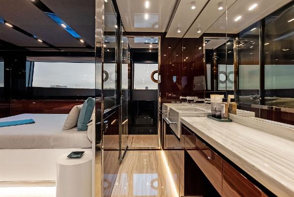 Slide: The Image of Luxurious interior of 2021 Riva 88' FOLGORE yacht with modern bedroom and bathroom. - 41