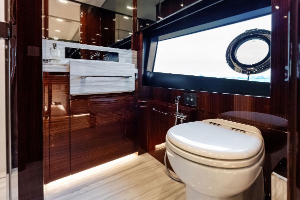 Slide: The Image of Luxurious bathroom on the 2021 Riva 88' FOLGORE yacht with modern fixtures and ocean view. - 47